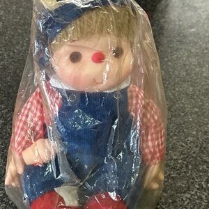 Vintage Charming Blue and Red Doll with Checkered Outfit
